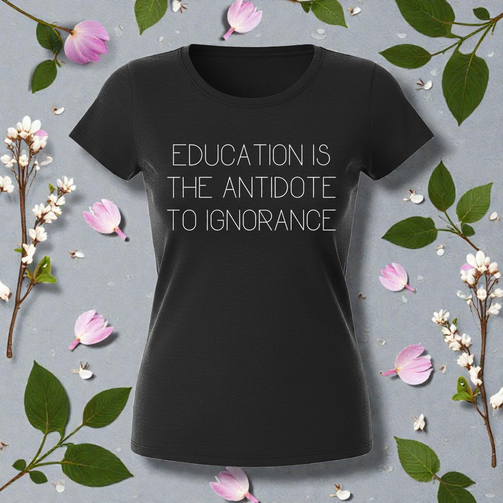Black t-shirt with 'Education is the Antidote to Ignorance' text on a floral background